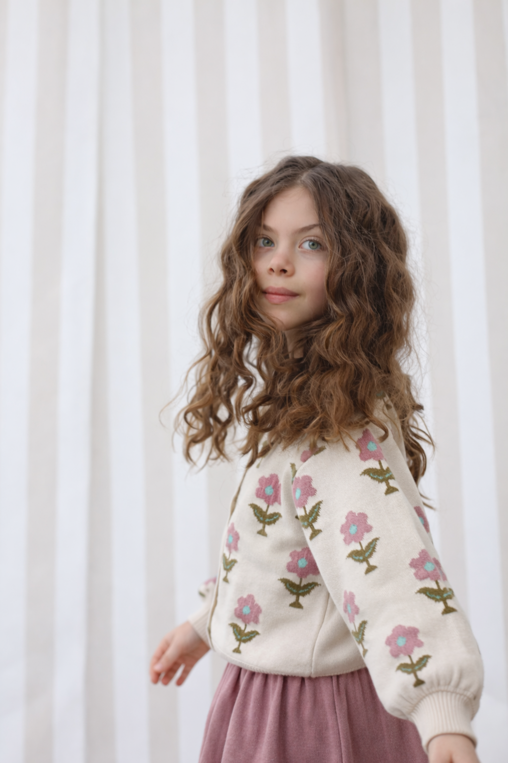 Two women in striped dresses
